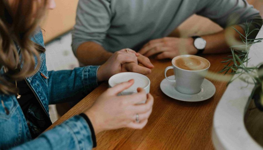 people chatting with coffee